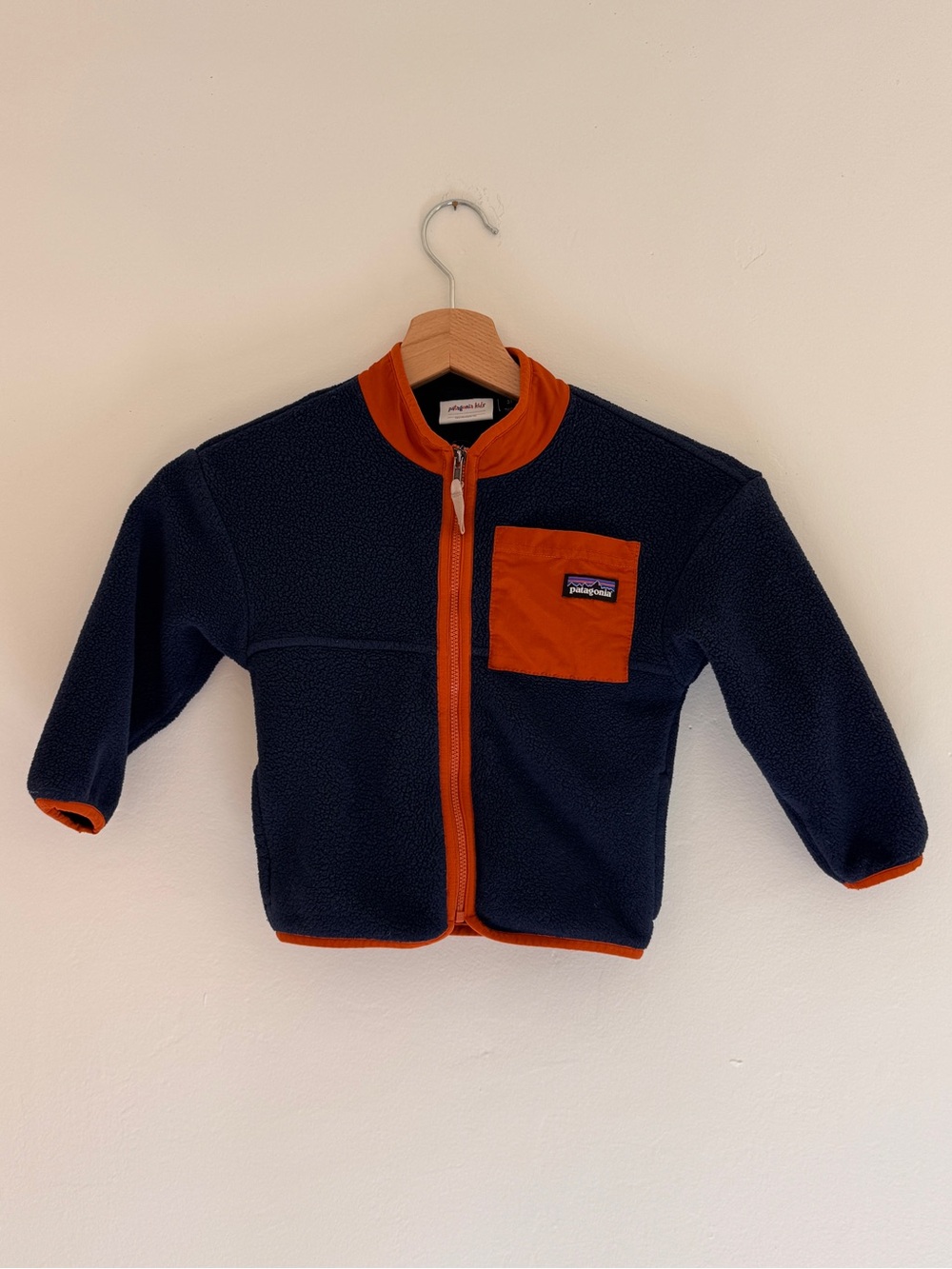 Patagonia Navy Fleece Jacket with Orange Trim